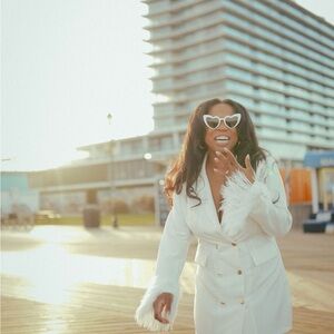 Chic White Blazer with Feather Details
